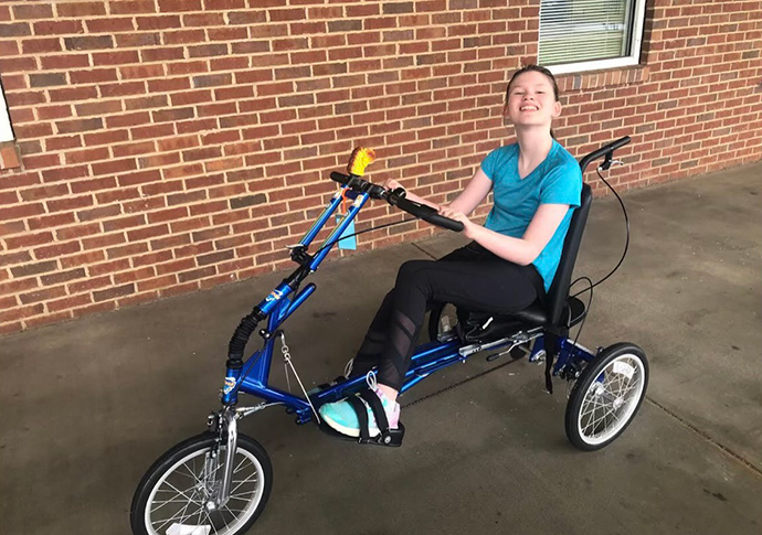 Georgia Power employee Crystal’s daughter, Madison, with her adapted bike.