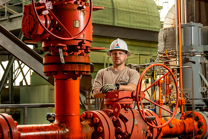 Plant Operator, Anthony Denney, performs maintenance on the units at Plant McDonough.