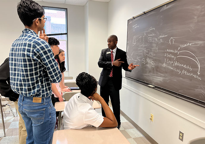 Georgia Power Central Region Executive Patrick Harris explains how Georgia Power operates to EarthCare students